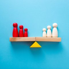 Uniqueness, balance, leadership and competition concept. seesaw weight scale in equilibrium